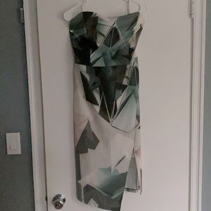 Sleeveless midi dress with a side split